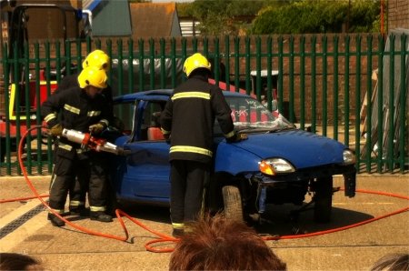 Demonstrating the car-cutting equipment